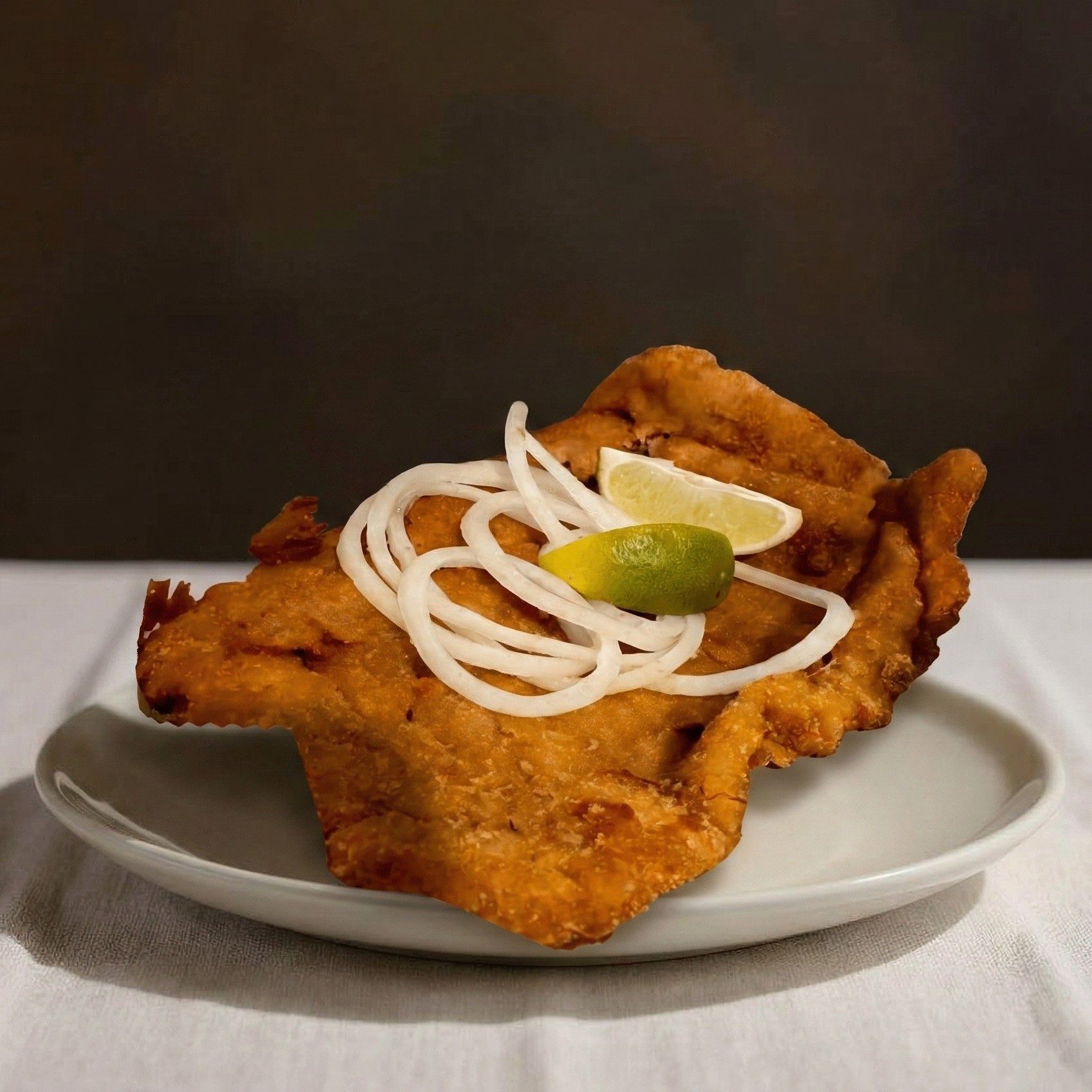Bistec Empanizado / Breaded Steak.